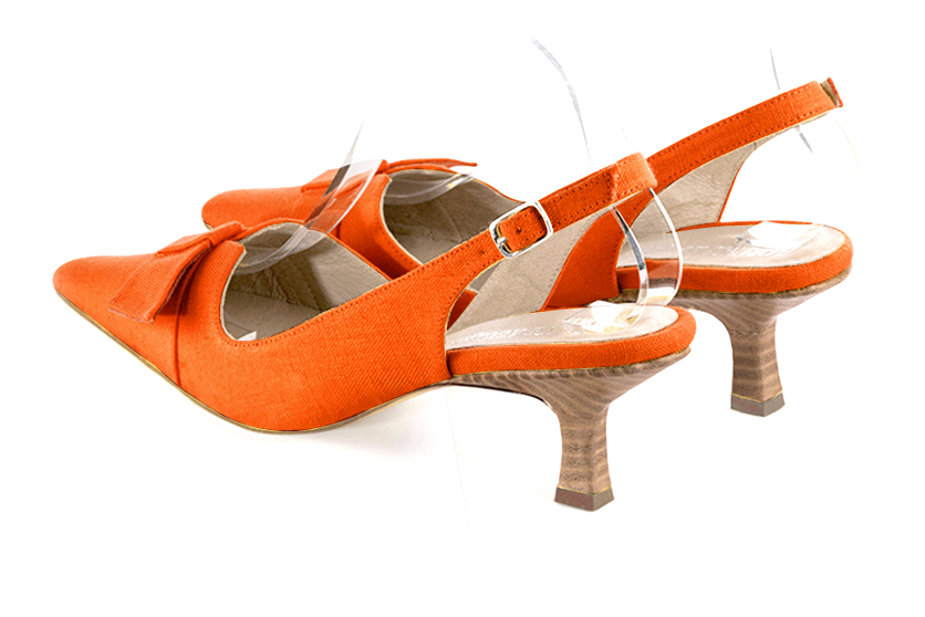 French elegance and refinement for these clementine orange dress slingback shoes, with a knot, 
                available in many subtle leather and colour combinations. The pretty French spirit of this beautiful pump will accompany your steps nicely and comfortably.
To be personalized or not, with your materials and colors.  
                Matching clutches for parties, ceremonies and weddings.   
                You can customize these shoes to perfectly match your tastes or needs, and have a unique model.  
                Choice of leathers, colours, knots and heels. 
                Wide range of materials and shades carefully chosen.  
                Rich collection of flat, low, mid and high heels.  
                Small and large shoe sizes - Florence KOOIJMAN
